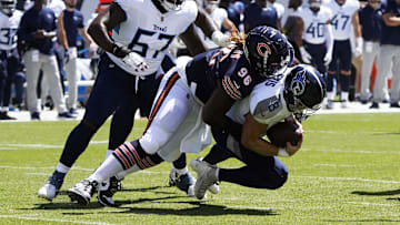Aug 12, 2023; Chicago, Illinois, USA; Chicago Bears defensive tackle Zacch Pickens (96) sacks Tennessee Titans quarterback Will Levis (8) during the first quarter at Soldier Field. Mandatory Credit: David Banks-Imagn Images