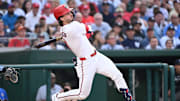 Aug 26, 2024; Washington, District of Columbia, USA; Washington Nationals center fielder Dylan Crews (3) watches the ball after hitting it into play during his first MLB at bat during the first inning against the New York Yankees at Nationals Park.