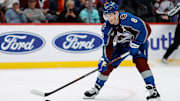 Dec 22, 2024; Denver, Colorado, USA; Colorado Avalanche defenseman Cale Makar (8) controls the puck in the second period against the Seattle Kraken at Ball Arena. Mandatory Credit: Isaiah J. Downing-Imagn Images