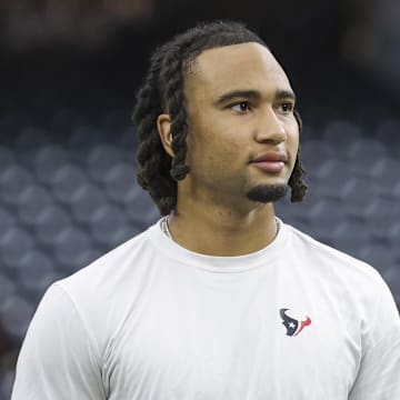 Sep 15, 2024; Houston, Texas, USA; Houston Texans quarterback C.J. Stroud (7) walks on the field before the game against the Chicago Bears at NRG Stadium. Mandatory Credit: Troy Taormina-Imagn Images