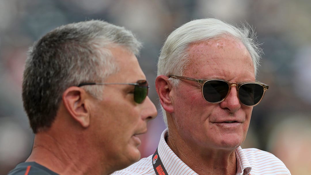Cleveland Browns co-owner Jimmy Haslam, right, chats with defensive coordinator Jim Schwartz before an NFL preseason football game at Cleveland Browns Stadium, Saturday, Aug. 17, 2024, in Cleveland, Ohio.