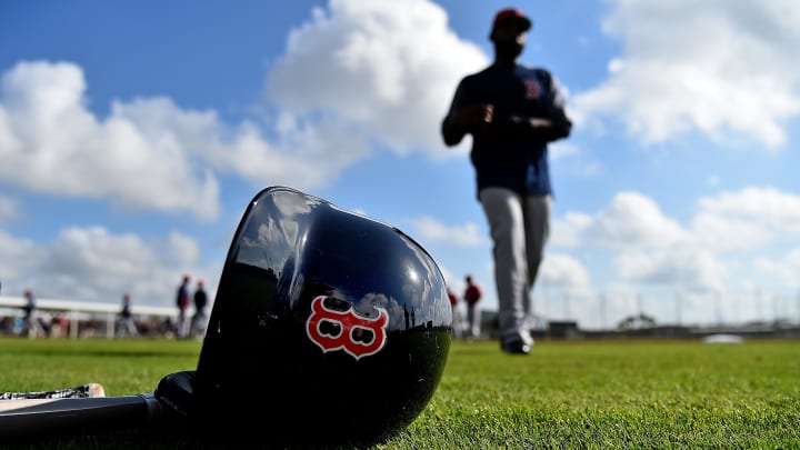 Feb 18, 2019; Lee County, FL, USA; A general view of a Boston Red Sox helmet as Boston Red Sox center fielder Jackie Bradley Jr. (19) walks on the field during a spring training workout at Jet Blue Park at Fenway South. Mandatory Credit: Jasen Vinlove-USA TODAY Sports