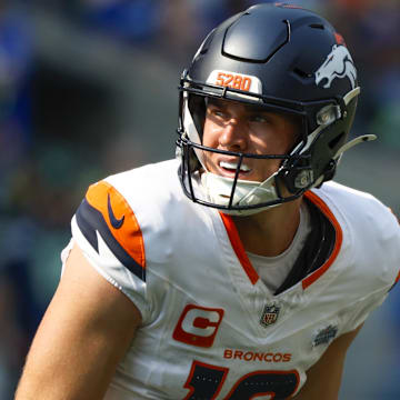 Sep 8, 2024; Seattle, Washington, USA; Denver Broncos quarterback Bo Nix (10) watches a replay following a failed third down conversion against the Seattle Seahawks during the second quarter at Lumen Field. 