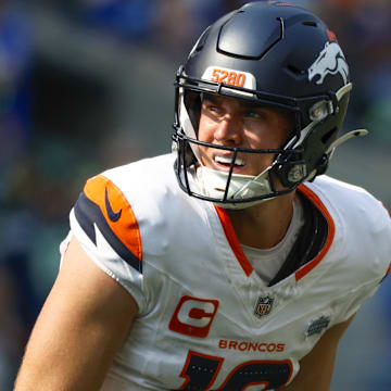 Sep 8, 2024; Seattle, Washington, USA; Denver Broncos quarterback Bo Nix (10) watches a replay following a failed third down conversion against the Seattle Seahawks during the second quarter at Lumen Field. 