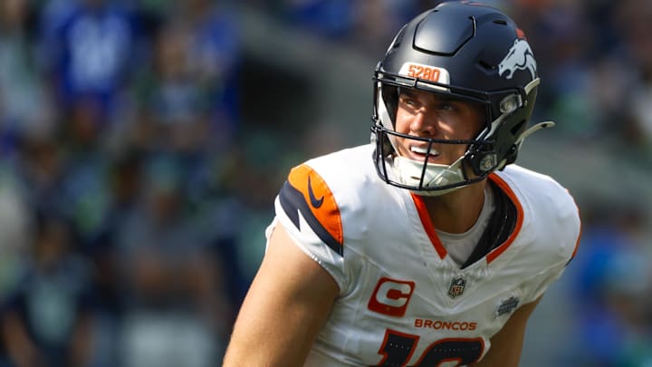 Sep 8, 2024; Seattle, Washington, USA; Denver Broncos quarterback Bo Nix (10) watches a replay following a failed third down conversion against the Seattle Seahawks during the second quarter at Lumen Field. 