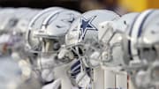 Jan 7, 2024; Landover, Maryland, USA; A view of Dallas Cowboys players' helmets on the bench against the Washington Commanders during the first quarter at FedExField. Mandatory Credit: Geoff Burke-Imagn Images