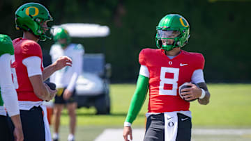 Oregon quarterback Dillon Gabriel walks the field during practice with the Ducks Tuesday, Aug. 13, 2024 at the Hatfield-Dowlin Complex in Eugene, Ore.
