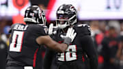 Atlanta Falcons linebacker Divine Deablo (0) and defensive tackle David Onyemata (90)