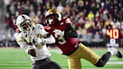 Nov 15, 2025; Chestnut Hill, Massachusetts, USA; Georgia Tech Yellow Jackets wide receiver Eric Rivers (3) makes a catch while being defended by Boston College Eagles defensive back Max Tucker (3) during the second half at Alumni Stadium. Mandatory Credit: Bob DeChiara-Imagn Images