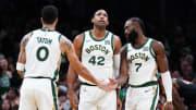 Nov 28, 2023; Boston, Massachusetts, USA; Boston Celtics guard Jaylen Brown (7) with forward Jayson Tatum and center Al Horford.