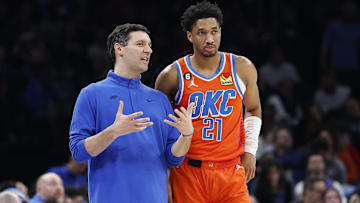 Feb 15, 2023; Oklahoma City, Oklahoma, USA; Oklahoma City Thunder head coach Mark Daigneault talks with Oklahoma City Thunder guard Aaron Wiggins (21) during a break against the Houston Rockets in the second quarter at Paycom Center. Mandatory Credit: Alonzo Adams-Imagn Images