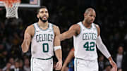 Nov 4, 2023; Brooklyn, New York, USA;  Boston Celtics forward Jayson Tatum (0) and center Al Horford (42) walk back to the bench after the Brooklyn Nets call a time out in the fourth quarter at Barclays Center. Mandatory Credit: Wendell Cruz-Imagn Images