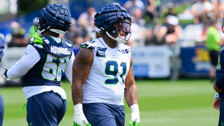 Jul 27, 2024; Renton, WA, USA; Seattle Seahawks defensive tackle Byron Murphy II (91) during training camp at Virginia Mason Athletic Center. Mandatory Credit: Steven Bisig-USA TODAY Sports