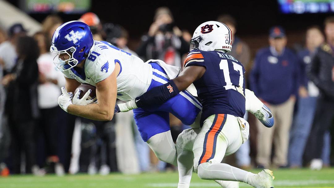 Nov 1, 2025; Auburn, Alabama, USA; Kentucky Wildcats tight end Willie Rodriguez (81) is tackled by Auburn Tigers linebacker Xavier Atkins (17) during the second quarter at Jordan-Hare Stadium. Mandatory Credit: John Reed-Imagn Images Nov 1, 2025; Auburn, Alabama, USA; Kentucky Wildcats tight end Willie Rodriguez (81) is tackled by Auburn Tigers linebacker Xavier Atkins (17) during the second quarter at Jordan-Hare Stadium. Mandatory Credit: John Reed-Imagn Images