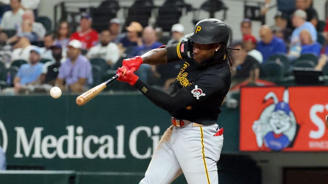 Aug 20, 2024; Arlington, Texas, USA; Pittsburgh Pirates designated hitter Oneil Cruz (15) hits a double during the seventh inning against the Texas Rangers at Globe Life Field. Mandatory Credit: Kevin Jairaj-USA TODAY Sports