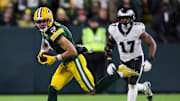 Green Bay Packers wide receiver Christian Watson (9) turns upfield after catching a pass against the Philadelphia Eagles on Monday, November 10, 2025, at Lambeau Field in Green Bay, Wis. The Eagles won the game, 10-7.
