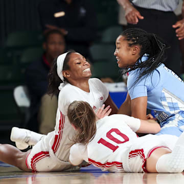 Nov 25, 2024; Paradise Island, Bahamas, BHS; Indiana Hoosiers guard Chloe Moore-McNeil (22) and Indiana Hoosiers guard Shay Ciezki (10) and North Carolina Tar Heels guard Grace Townsend (2) battle for a loose ball during the first half at the Atlantis Resort. 