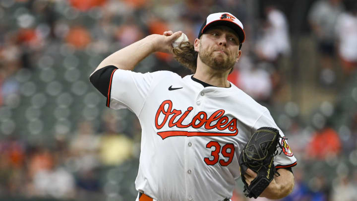 Jul 30, 2024; Baltimore, Maryland, USA;  Baltimore Orioles pitcher Corbin Burnes (39) delivers a first-inning pitch against the Toronto Blue Jays at Oriole Park at Camden Yards. 