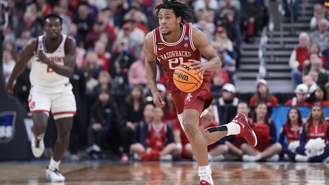 Mar 22, 2025; Providence, RI, USA; Arkansas Razorbacks guard D.J. Wagner (21) dribbles during the second half of a second round men’s NCAA Tournament game against the St. John's Red Storm at Amica Mutual Pavilion. Mandatory Credit: Gregory Fisher-Imagn Images