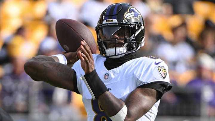 Nov 17, 2024; Pittsburgh, Pennsylvania, USA; Baltimore Ravens quarterback Lamar Jackson (8) warms up for a game against the Pittsburgh Steelers at Acrisure Stadium. Mandatory Credit: Barry Reeger-Imagn Images