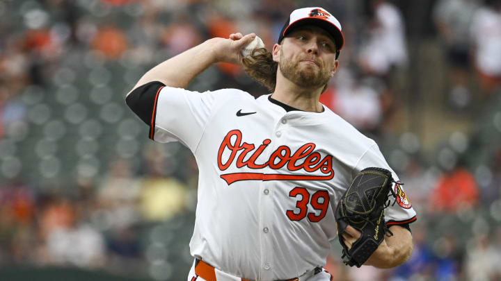 Jul 30, 2024; Baltimore, Maryland, USA;  Baltimore Orioles pitcher Corbin Burnes (39) delivers a first inning pitch against the Toronto Blue Jays at Oriole Park at Camden Yards. 