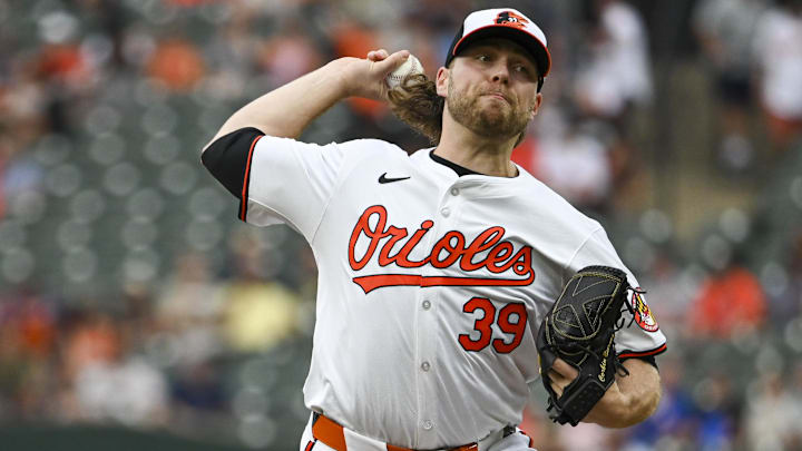 Jul 30, 2024; Baltimore, Maryland, USA;  Baltimore Orioles pitcher Corbin Burnes (39) delivers a first inning pitch against the Toronto Blue Jays at Oriole Park at Camden Yards.