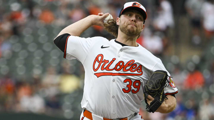 Jul 30, 2024; Baltimore, Maryland, USA;  Baltimore Orioles pitcher Corbin Burnes (39) delivers a first inning pitch against the Toronto Blue Jays at Oriole Park at Camden Yards