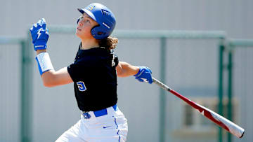 Ethan Holliday hits during a Stillwater High School baseball game in Stillwater, Okla., Saturday, April 30, 2022.