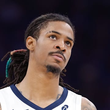 Apr 22, 2025; Oklahoma City, Oklahoma, USA; Memphis Grizzlies guard Ja Morant (12) walks down the court in the third quarter of game two of first round for the 2024 NBA Playoffs against the Oklahoma City Thunder at Paycom Center. Mandatory Credit: Alonzo Adams-Imagn Images
