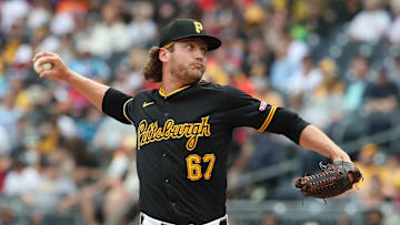 Jun 8, 2025; Pittsburgh, Pennsylvania, USA; Pittsburgh Pirates relief pitcher Braxton Ashcraft (67) pitches against the Philadelphia Phillies during the eighth inning at PNC Park. Mandatory Credit: Charles LeClaire-Imagn Images