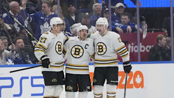 Apr 24, 2024; Toronto, Ontario, CAN; Boston Bruins defenseman Hampus Lindholm (27) and forward