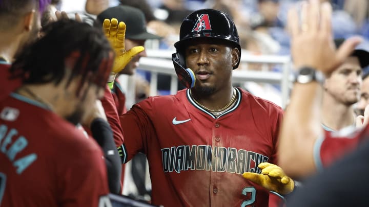 Aug 21, 2024; Miami, Florida, USA;  Arizona Diamondbacks shortstop Geraldo Perdomo (2) reacts after hitting a home run against the Miami Marlins in the eighth inning at loanDepot Park. Mandatory Credit: Rhona Wise-USA TODAY Sports