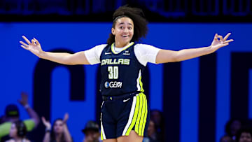 Jul 30, 2025; Arlington, Texas, USA;  Dallas Wings guard Haley Jones (30) celebrates after scoring against the Atlanta Dream during the second half at College Park Center. Mandatory Credit: Kevin Jairaj-Imagn Images