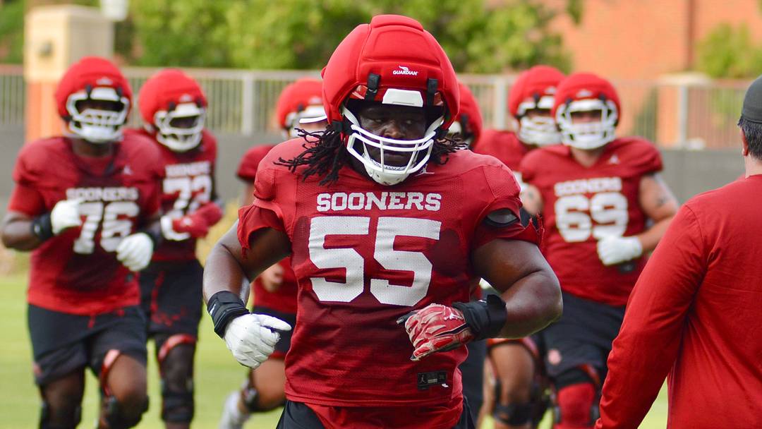Oklahoma offensive lineman Eddy Pierre-Louis runs during practice. Oklahoma offensive lineman Eddy Pierre-Louis runs during practice.