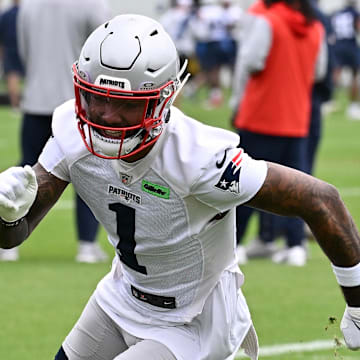 Jun 9, 2025; Foxborough, MA, USA; New England Patriots wide receiver Ja'Lynn Polk (1) runs through a drill during minicamp at Gillette Stadium. Mandatory Credit: Eric Canha-Imagn Images