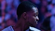 Mar 7, 2025; Sacramento, California, USA; San Antonio Spurs guard De'Aaron Fox (4) looks on during the National Anthem before the game against the Sacramento Kings at Golden 1 Center.