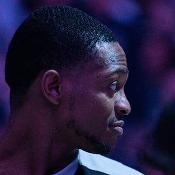 Mar 7, 2025; Sacramento, California, USA; San Antonio Spurs guard De'Aaron Fox (4) looks on during the National Anthem before the game against the Sacramento Kings at Golden 1 Center.