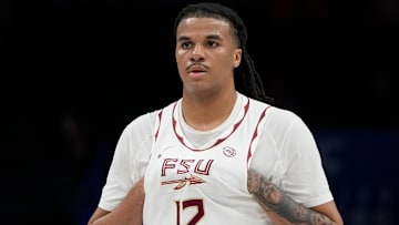 Florida State Seminoles forward Malique Ewin (12) on the court in the first half at Spectrum Center. Mandatory Credit: Bob Donnan-Imagn Images