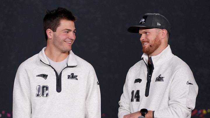 Seattle Seahawks quarterback Sam Darnold (14) and New England Patriots quarterback Drake Maye (10) 
