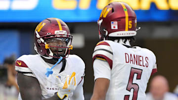 Washington Commanders quarterback Jayden Daniels and wide receiver Deebo Samuel Sr. 