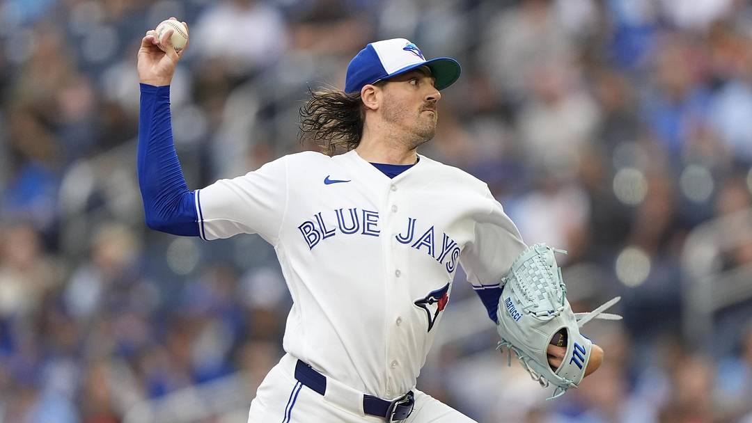 Jun 25, 2026; Toronto, Ontario, CAN; Toronto Blue Jays starting pitcher Kevin Gausman (34) pitches to the Texas Rangers during the first inning at Rogers Centre. Mandatory Credit: John E. Sokolowski-Imagn Images