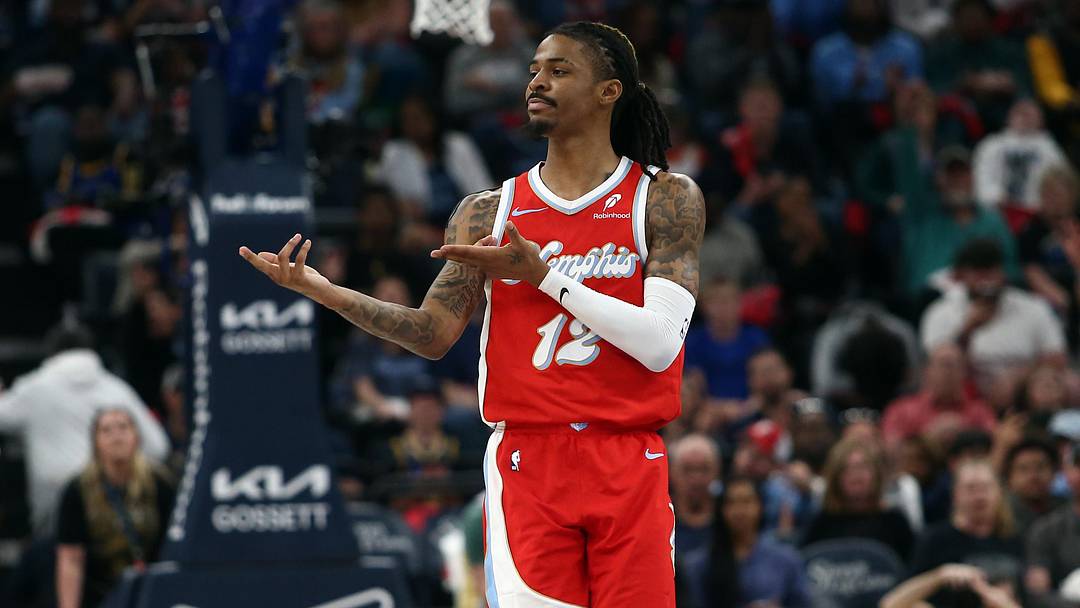 Apr 1, 2025; Memphis, Tennessee, USA; Memphis Grizzlies guard Ja Morant (12) reacts after a basket during the second quarter against the Golden State Warriors at FedExForum. Mandatory Credit: Petre Thomas-Imagn Images