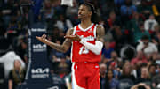 Apr 1, 2025; Memphis, Tennessee, USA; Memphis Grizzlies guard Ja Morant (12) reacts after a basket during the second quarter against the Golden State Warriors at FedExForum. Mandatory Credit: Petre Thomas-Imagn Images