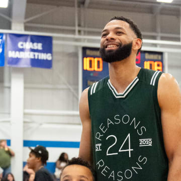 Pedro Bradshaw takes photos with fans after the Be The Reason celebrity basketball game on Thursday, June 20, 2024. 24 Reasons Inc. organized the game to raise awareness for suicide prevention.