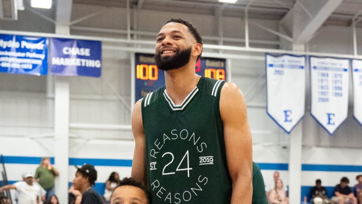 Pedro Bradshaw takes photos with fans after the Be The Reason celebrity basketball game on Thursday, June 20, 2024. 24 Reasons Inc. organized the game to raise awareness for suicide prevention.