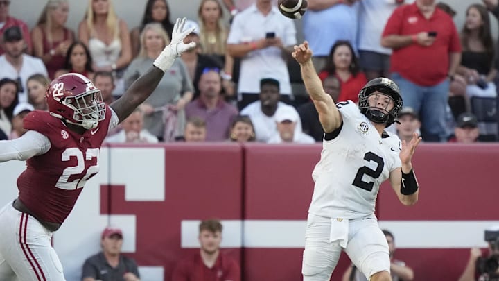 Oct 4, 2025; Tuscaloosa, Alabama, USA;  Alabama defensive lineman LT Overton (22) pressures Vanderbilt quarterback Diego Pavia (2) at Saban Field at Bryant-Denny Stadium. Alabama downed Vanderbilt 30-14. Mandatory Credit: Gary Cosby Jr.-Imagn Images