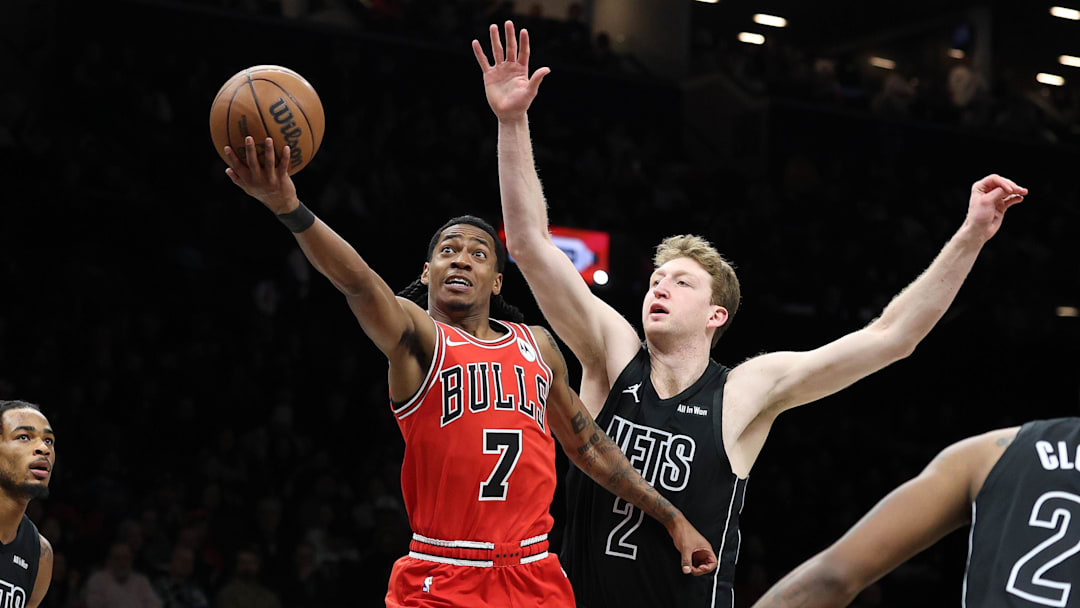 Feb 9, 2026; Brooklyn, New York, USA; Chicago Bulls guard Rob Dillingham (7) goes to the basket against Brooklyn Nets forward Danny Wolf (2) during the first half at Barclays Center. Mandatory Credit: Vincent Carchietta-Imagn Images