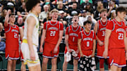 Prosser players celebrate as the final seconds tick off the clock of a 64-50 victory against Lynden in the 2A boys state basketball tournament Thursday, at the Yakima Valley SunDome. 