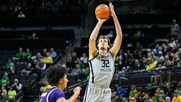 Dec 15, 2024; Eugene, Oregon, USA;  Oregon Ducks center Nate Bittle (32) shoots a jump shot during the first half against the Stephen F. Austin Lumberjacks at Matthew Knight Arena.