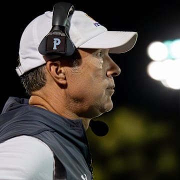 Male Head coach Chris Wolfe looked on from the sideline as his Bulldogs faced off in KHSAA football action at Ballard High School on Friday night. Male held on to defeat Ballard 17-14. August 29, 2025.